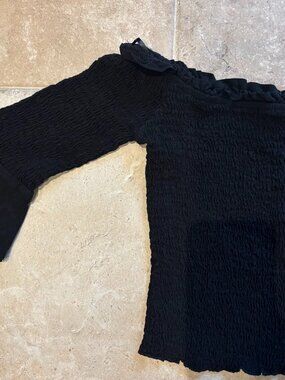 Smocked off the shoulder black top